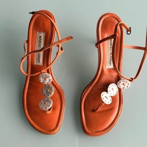 Manolo Blahnik pumpkin colored button heels